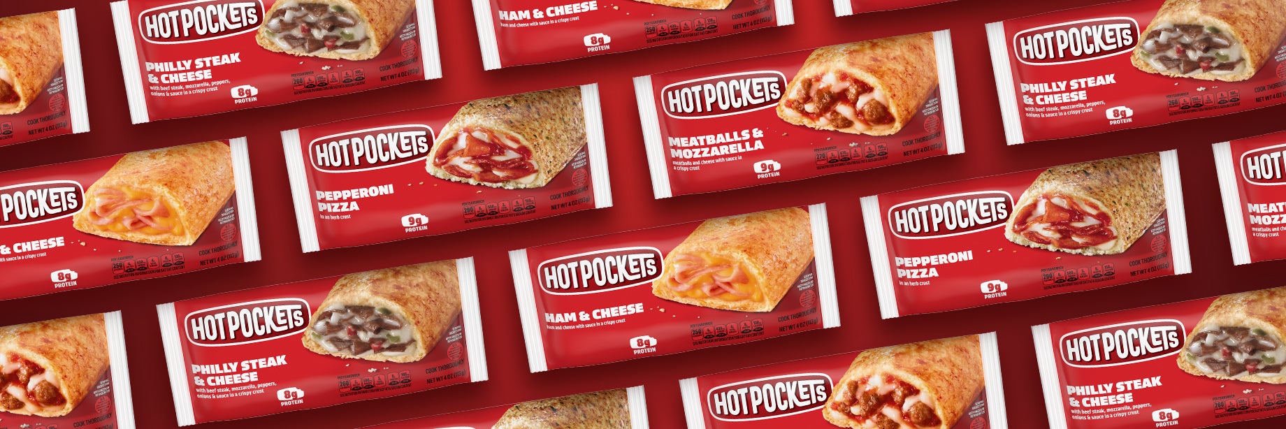 Various Hot Pockets flavors lined up on a shelf.