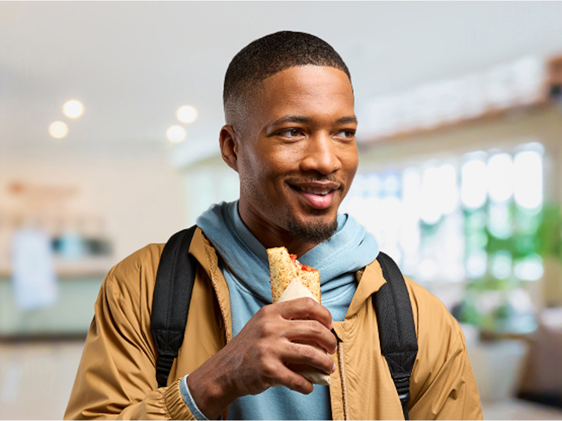 man holding hot pocket