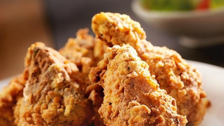 Plate of fried chicken and waffles