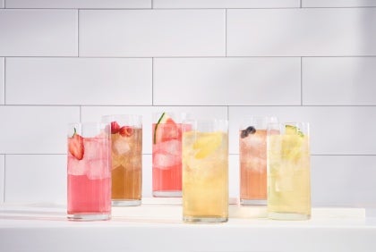 Flavor Infused Waters &amp; Iced Coffees in glass with fruit